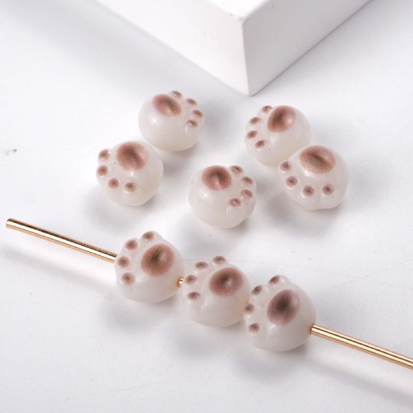 Wholesale 100PCS PACK Cartoon Cute Three-dimensional Cat Claw Straight Hole Acrylic String Beads For Discount