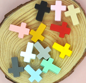 Wholesale 200pcs Silicone Macaron Cross Beads For Cheap